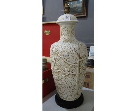 Oriental style blanc de chine type moulded blossom and foliage design lamp base.(B.P. 21% + VAT) 