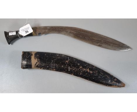 Nepalese Kukri in leather scabbard.  (B.P. 21% + VAT) 