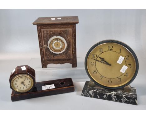 Ceramic mantle clock with back winding movement, mid century Art Deco design circular mantle clock with marble base and back 