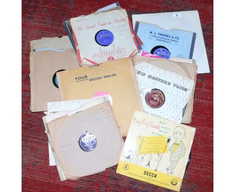 A collection of 78s including Buddy Holly, Elvis Presley etc.