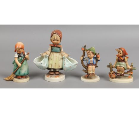 Four Goebel M. I. Hummel pottery figures, three (AF).