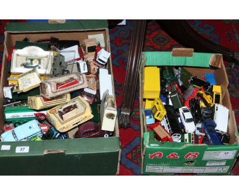 Two boxes of Diecast metal model vehicles including Eddie Stobart, Lledo, Corgi etc.