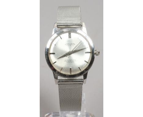 A gentlemans Citizen stainless steel bracelet watch with satin dial baton markers and centre seconds.
