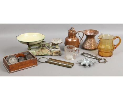 A collection of metal and glasswares to include an early C19th faceted mug, copper wares, vintage scales and weights etc.
