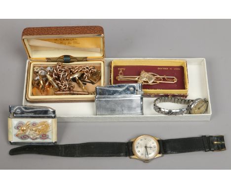 A box of jewellery and collectables including two lighters, two wristwatches, a gold plated Stratton equestrian bar brooch an