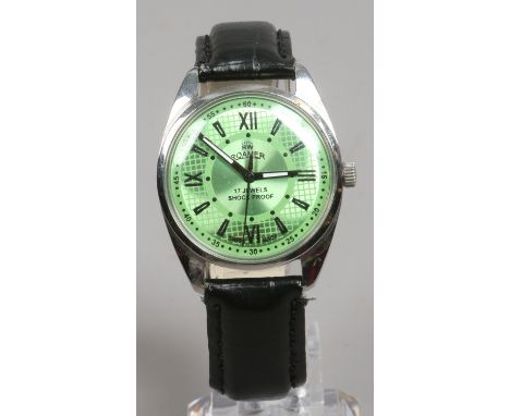 A gentlemans Roamer stainless steel manual wristwatch with metallic green dial and centre seconds.