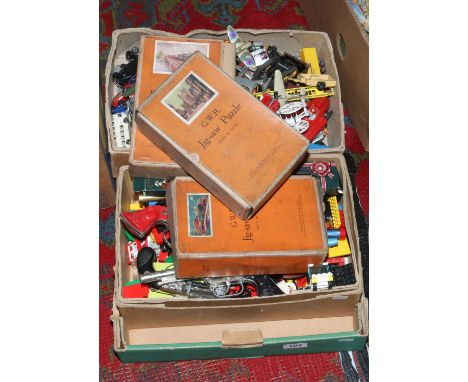 A box of vintage toys including Matchbox and Corgi diecast vehicles, cap guns, Lego, GWR jigsaw puzzles etc.