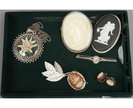 Five silver brooches including a Wedgwood cameo example along with marcasite earrings and a silver pendant on chain.