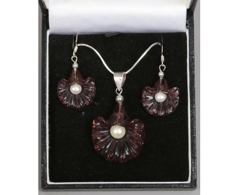 A suite of silver jewellery set with carved hardstone and cultured pearls formed as flower heads including a pendant on chain