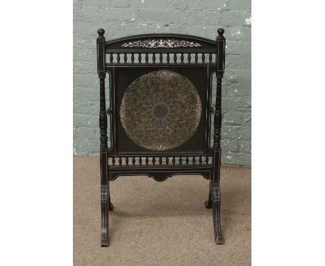 A Victorian firescreen with bone inlay and silver wire embroidered panel.