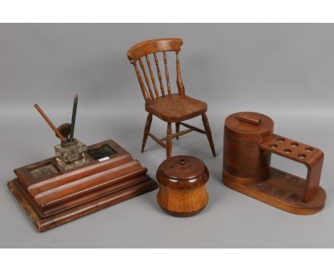 A miniature dolls chair, desk stand, pipe rack and tobacco jars.