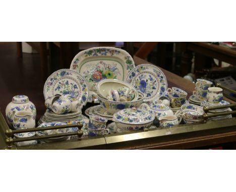 A large quantity of Masons Ironstone tea and dinner wares decorated in the Regency pattern including plates, cups and saucers