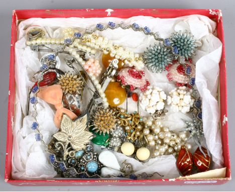 A group of vintage costume jewellery including brooches, stick pins, earrings etc.