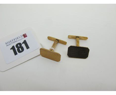 A Pair of 9ct Gold HG&amp;S SwivLink Cufflinks, the rectangular panels with engine turned decoration (5grams). 