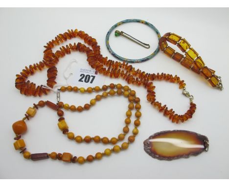 A Vintage Multi Amber Coloured Graduated Bead Necklace, together with a modern amber necklace, a cloisonné enamel bangle, aga
