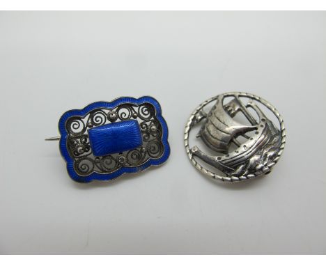 Marius Hammer; A Norwegian Enamel Brooch, of shaped design, stamped maker's mark and "930S"; together with a Viking Ship broo