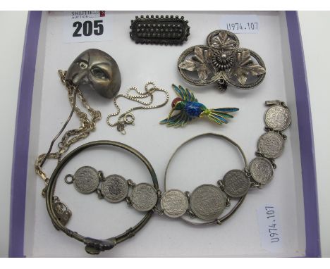 A Decorative Gilt Filigree and Enamel Bird Brooch, stamped "800"; a 'Tostrup' ivy leaf brooch (lacking pin); vintage coin bra