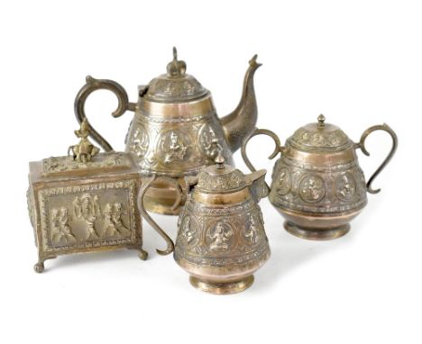 A late 19th/early 20th century Indian three-piece white alloy metal tea set comprising a teapot with figure riding elephant f