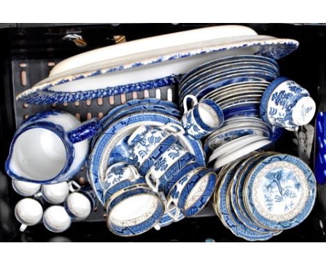 A Booths 'Real Old Willow' part tea and dinner service, a Royal Doulton 'Geneva' jug and one other blue and white meat plate.