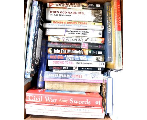 Three boxes of books relating to war to include 'Land Mines in War and Peace', 'When God Made Hell', 'A History of Royal Ordn