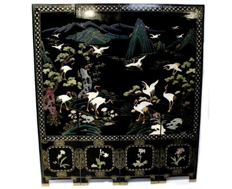 A modern Chinese black lacquer and Chinoiserie decorated four-leaf folding screen, each panel inlaid with shibayama-style app