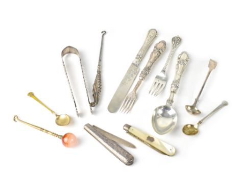 Various silver items comprising sugar tongs, glove hook, pickle fork, fruit knife, dessert spoon, condiment spoon, a mother o