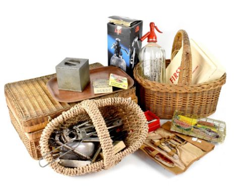A group of vintage collectibles to include a c1950s picnic basket, two vintage baskets, a Boots white plastic First Aid box, 