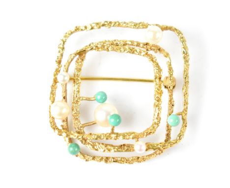 A vintage hallmarked 9ct gold brooch designed as three graduated interlocking squares of textured form embellished with attac