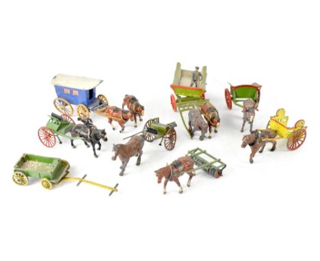 A quantity of Britain's and other makes painted lead agricultural machines to include horse and carts, haymaking machines, ye