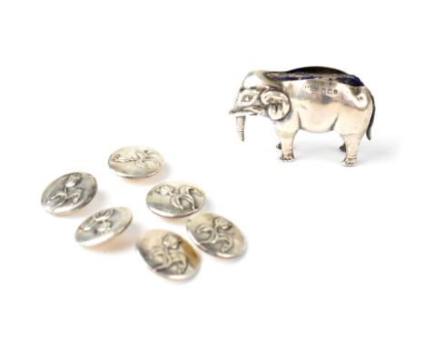 An Edward VII hallmarked silver pin cushion in the form of an elephant, maker's mark indistinct, London 1902, a set of six Ed