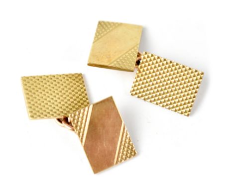 A pair of hallmarked 9ct gold cufflinks of rectangle shape and engine turned decoration united with gold chain links, marked 
