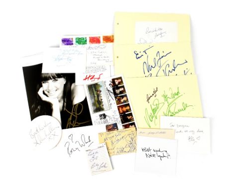 VARIOUS; a group of autographed ephemera including a photograph signed by Donna Karan, a first day cover signed by Douglas Ba