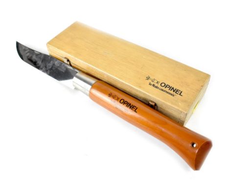 A large cased Opinel shop counter display model N13 lock knife, length of the knife folded 28cm.