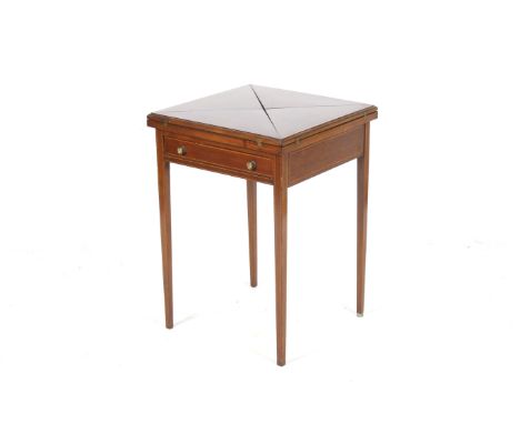 An Edwardian mahogany envelope card table. The hinged top enclosing a baize lined playing surface, above a long frieze drawer