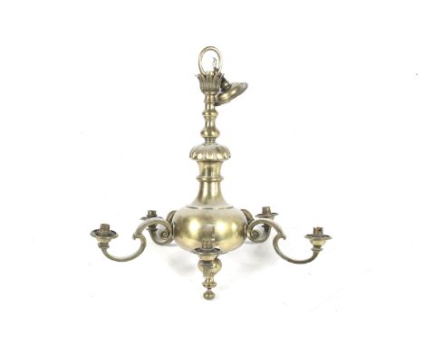 A early 20th century brass chandelier. Having four scrolling branches, has been altered for electrical use, 73cm high (includ