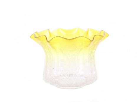 A 19th century yellow glass oil lamp shade. Having etched floral decoration and a fluted edge, 19cm diameter Condition Report