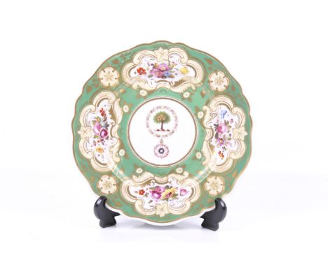 A Chamberlain Worcester porcelain plate. Circa 1832-1840, the scalloped dish with a border of floral bouquet cartouche agains