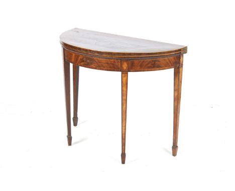 A 19th century Georgian mahogany demi lune card table. With a folding top lined with green baize, boxwood line inlay to the s