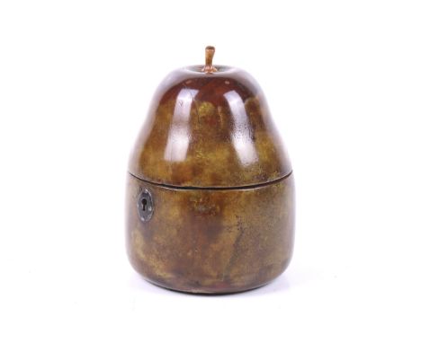 A Georgian fruitwood pear shaped tea caddy. The hinged cover with stalk finial, missing the key, 15cm high