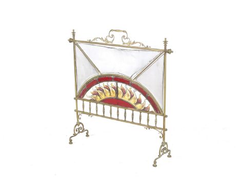 A early 20th century brass framed fire screen. Having a scrolling handle to the top, the screen featuring a semi-circular lea