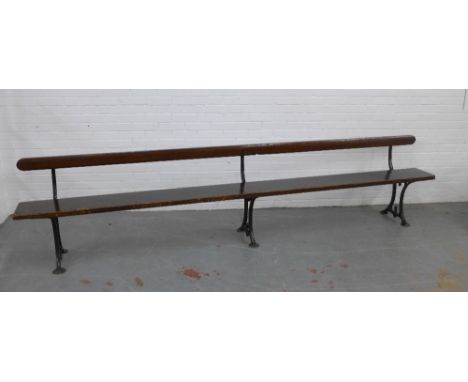 Early 20th century stained pine pew / bench with black iron supports, 330 x 73 x 28cm 