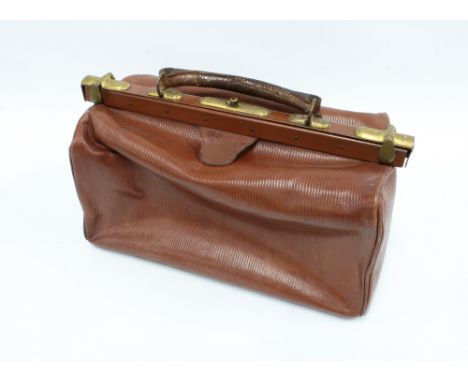 Vintage brown leather Gladstone, bag with brass mounts and canvas interior, 40 cm long 