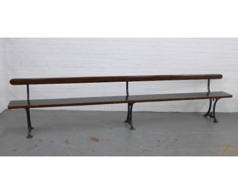 Early 20th century stained pine pew / bench with black iron supports, 330 x 73 x 28cm 