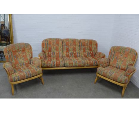 An Ercol light elm Windsor three piece suite, with loose cushions, 195 x 82 x 56cm. 