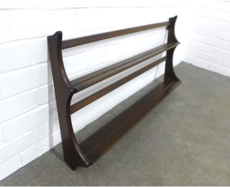 An Ercol dark elm wall plate rack, 97 x 50cm. 