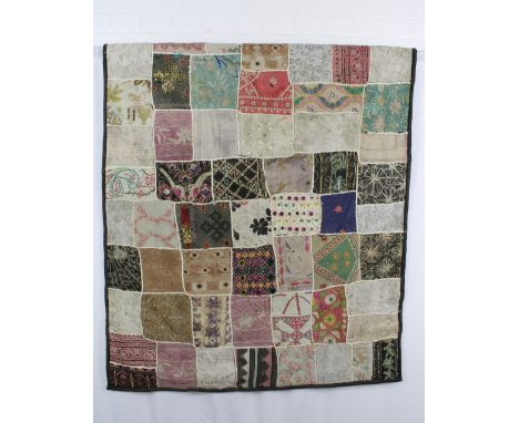 Patchwork quilt, with some crewelwork and embroidered panels, and mirror applique, 155 x 100cm 