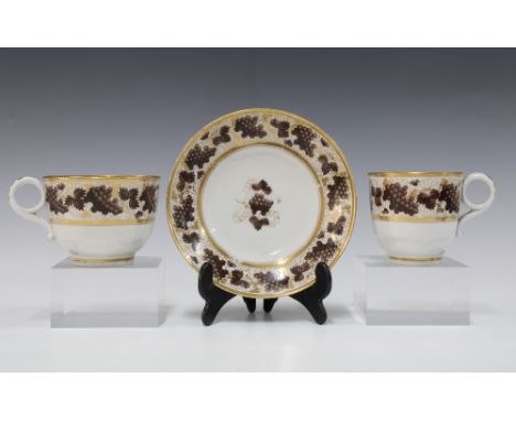 18th century Worcester Barr trio comprising two cups and a saucer with fruiting vine pattern, saucer with impressed B mark (3