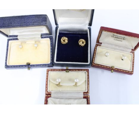 Two pairs of Gents pearl shirt studs mounted in 18ct gold, with original boxes, a pair of pearl stud earrings and a pair of y