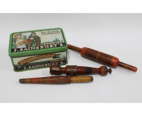 Vintage Sainsbury's tin, together with three sweetie rolling pins, longest 31cm (4) 