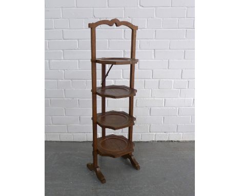 A vintage folding cake stand, 31 x 94cm. 